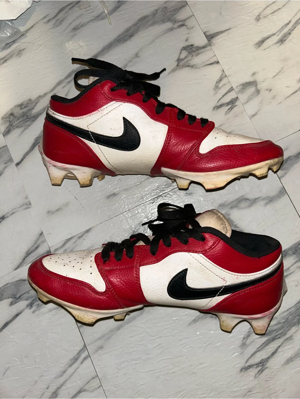 Jordan 1 low cleats.